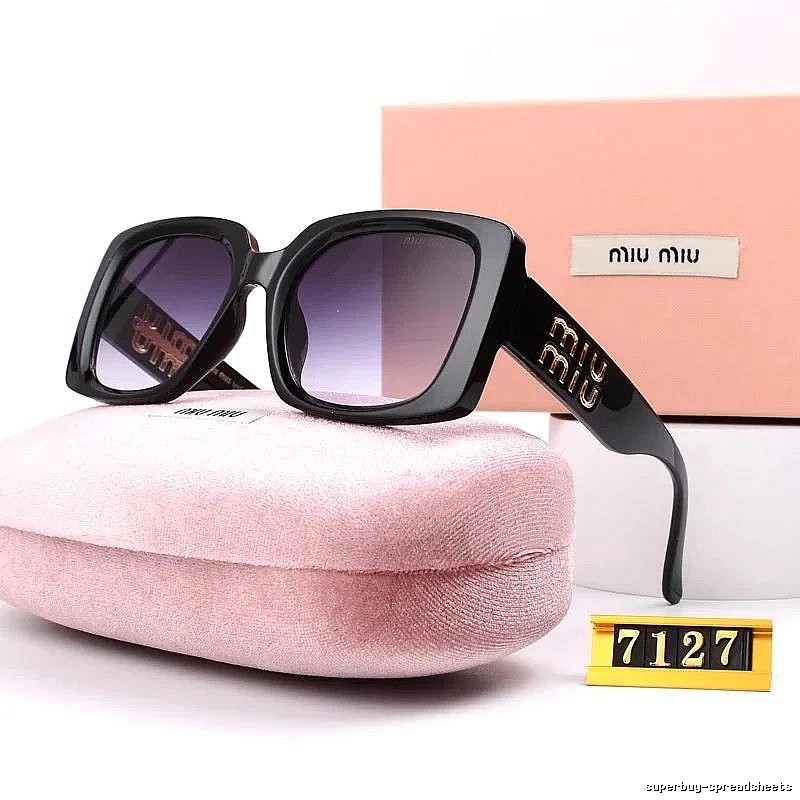 Miu Miu Compact Oversized sunglasses Black Oval Sunglasses for Smart Casual Looks